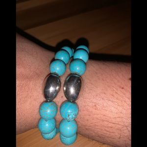 Pair of turquoise stone beads with sterling silver and stainless steel accents